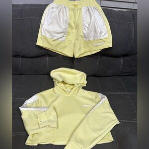 2piece shorts set.see visible marks on sleeves,one of which seems to be ink mark